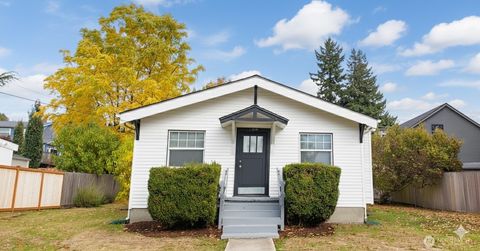 Photo of 11044 1st Avenue NW, Seattle, WA 98177 (MLS # 2446957)