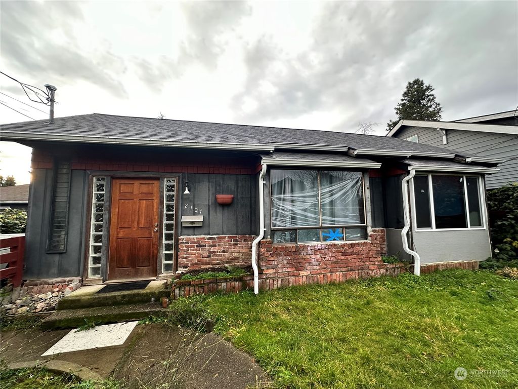 Photo of 8127 49th Avenue S, Seattle, WA 98118 (MLS # 2318340)
