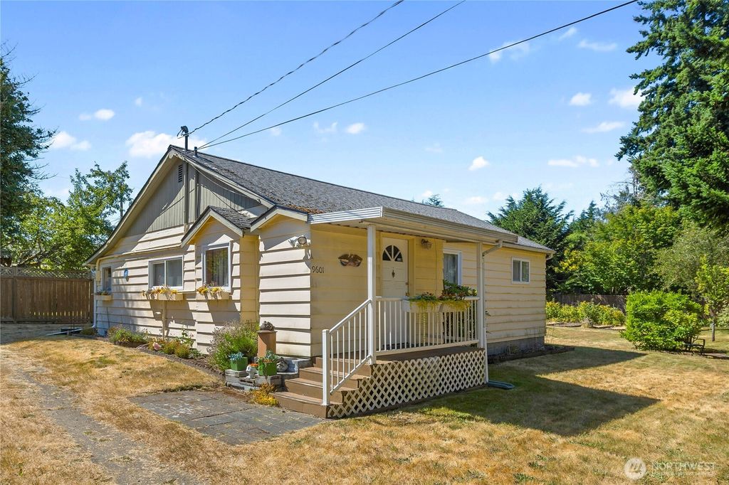 Photo of 9601 12th Avenue NW, Seattle, WA 98117 (MLS # 2409950)