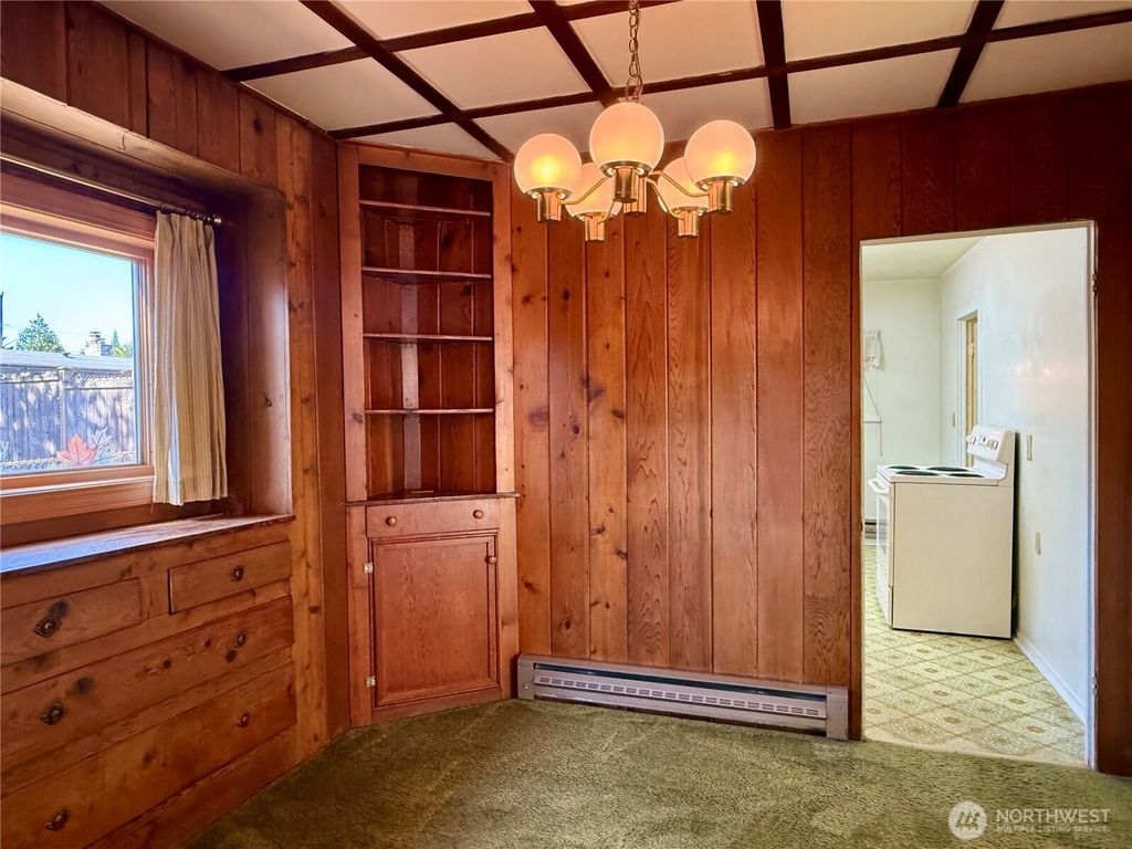 Photo of 9601 12th Avenue NW, Seattle, WA 98117 (MLS # 2409950)