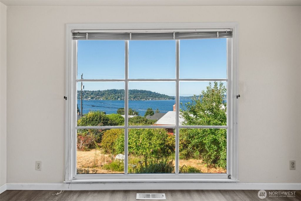 Photo of 10658 Laurel Lane S, Seattle, WA 98178 (MLS # 2421427)