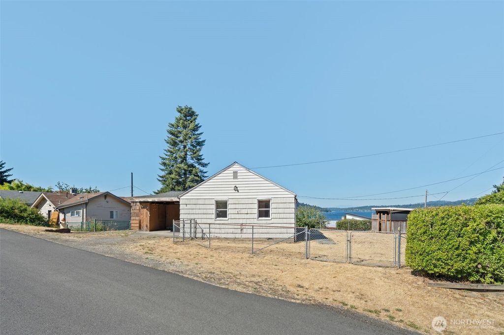 Photo of 10658 Laurel Lane S, Seattle, WA 98178 (MLS # 2421427)