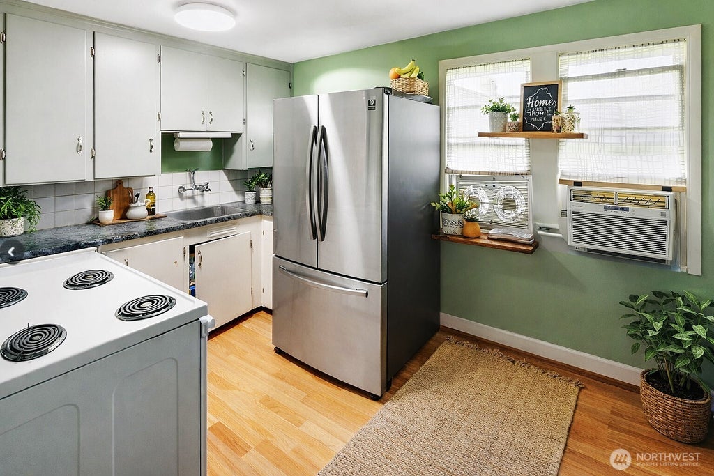 Photo of 3820 3822 14th Ave S Ave, Seattle, WA 98108 (MLS # 2461541)