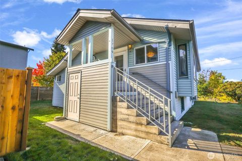 Photo of 1709 SW Cloverdale Street, Seattle, WA 98106 (MLS # 2445310)