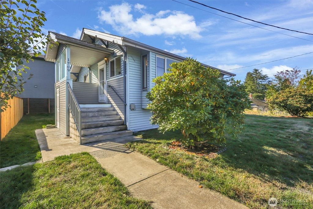 Photo of 1709 SW Cloverdale Street, Seattle, WA 98106 (MLS # 2445310)