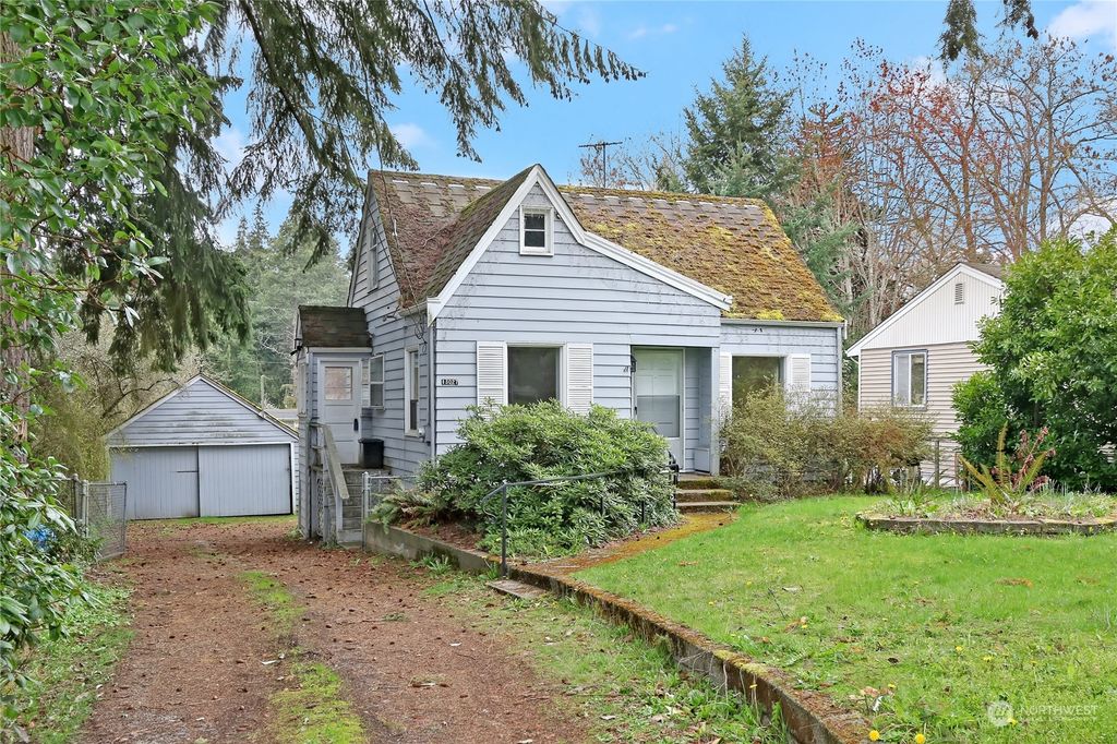 Photo of 13027 30th Avenue NE, Seattle, WA 98125 (MLS # 2057791)