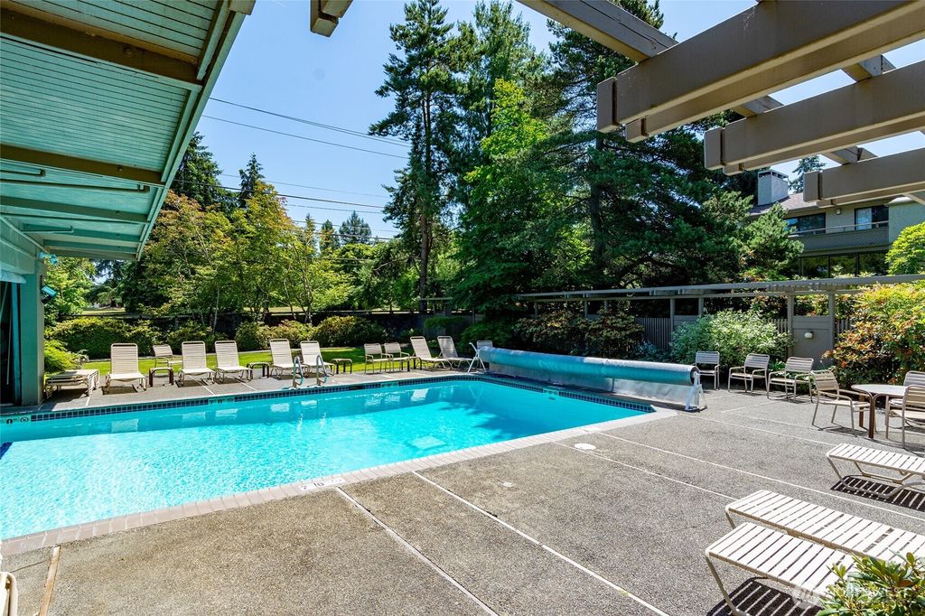 Photo of 6648 Park Point Way NE #D-111, Seattle, WA 98115 (MLS # 2470016)