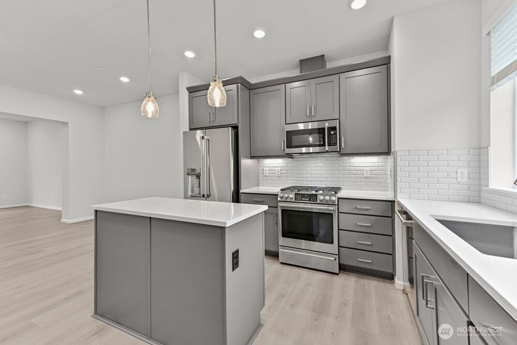 Photo of 19288 NE 69th Circle #104, Redmond, WA 98052 (MLS # 2444454)