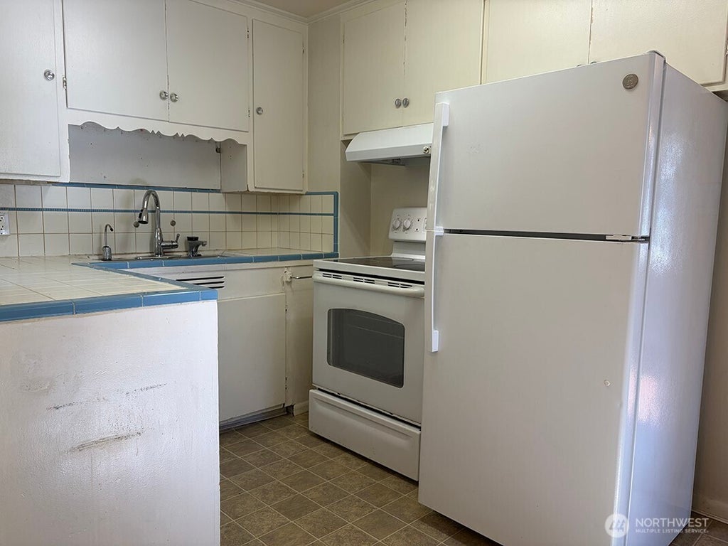 Photo of 11225 Woodley Avenue S, Seattle, WA 98178 (MLS # 2593944)