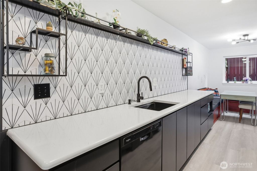 Photo of 4525 S Henderson Street #102, Seattle, WA 98118 (MLS # 2487953)