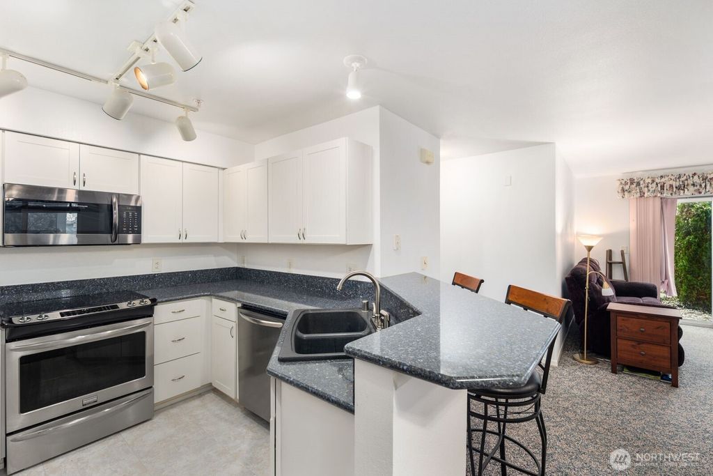 Photo of 11130 SE 208th Street #H103, Kent, WA 98031 (MLS # 2505560)