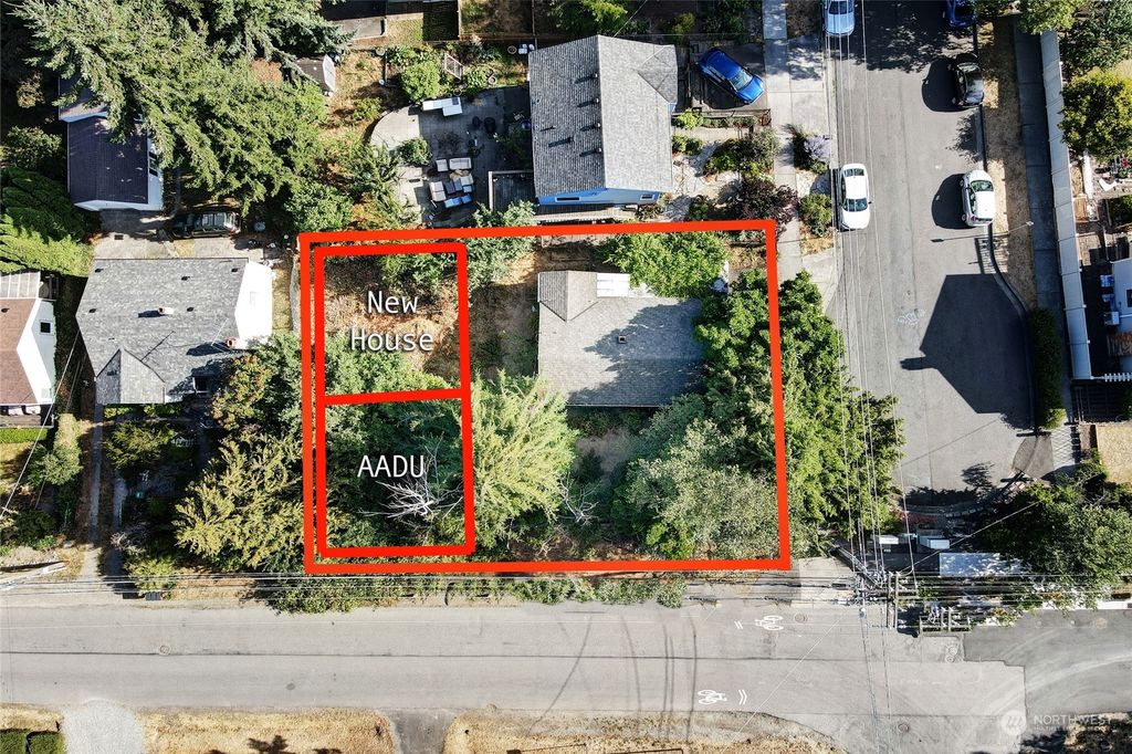 Photo of 303 NE 115th Street, Seattle, WA 98125 (MLS # 2138675)