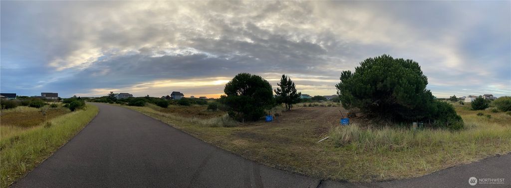 Photo of 437 S Bel Air Loop, Ocean Shores, WA 98569 (MLS # 2461178)