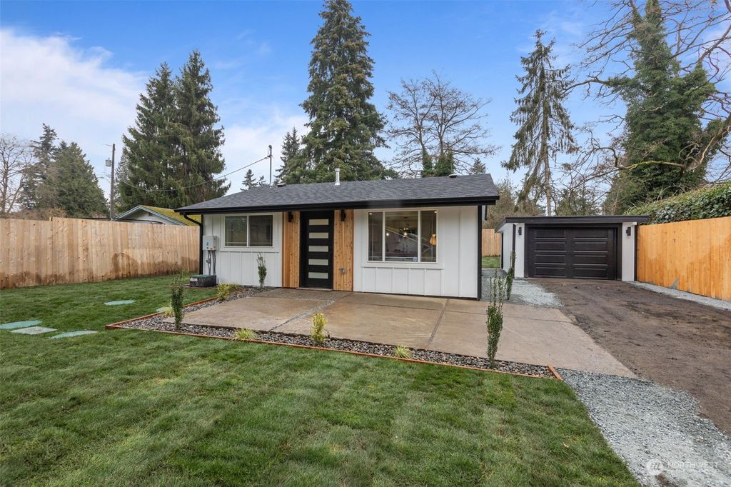 Photo of 12440 10th Avenue S, Seattle, WA 98168 (MLS # 2322143)