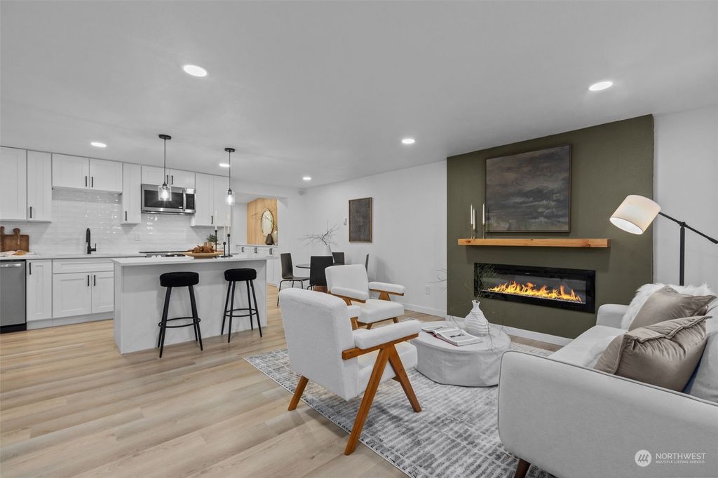 Photo of 12440 10th Avenue S, Seattle, WA 98168 (MLS # 2322143)