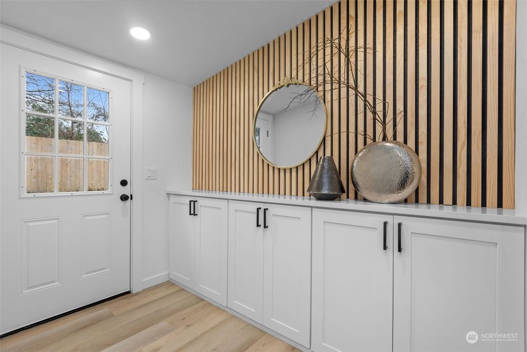 Photo of 12440 10th Avenue S, Seattle, WA 98168 (MLS # 2322143)