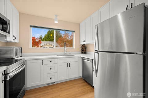 Photo of 12024 101st Avenue NE #E2, Kirkland, WA 98034 (MLS # 2542853)