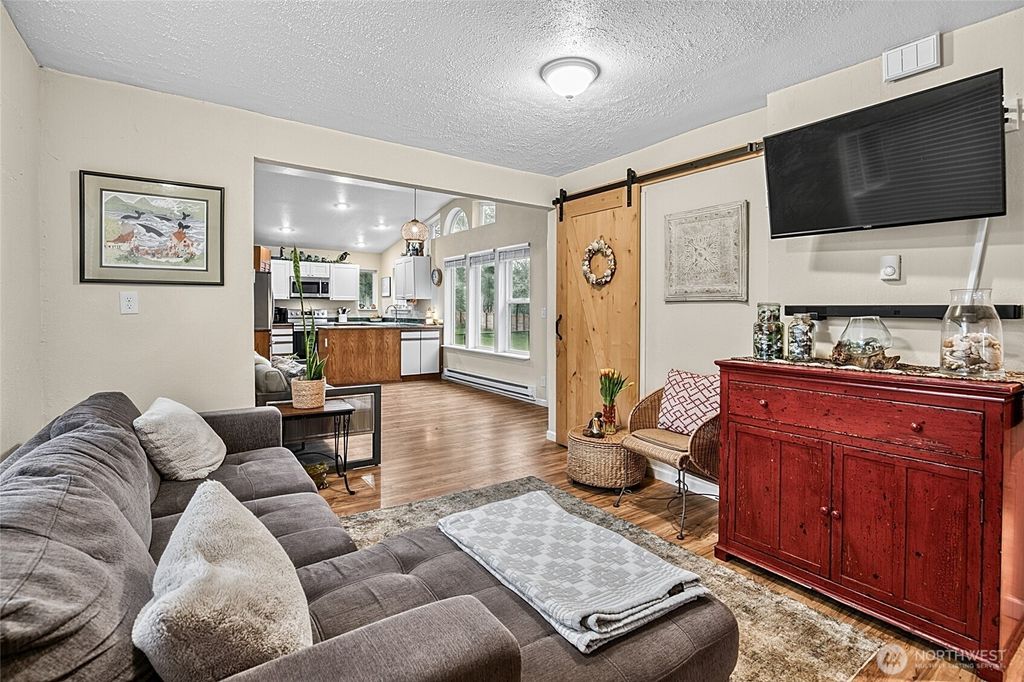 Photo of 214 S Narwhal Loop SW, Ocean Shores, WA 98569 (MLS # 2491858)