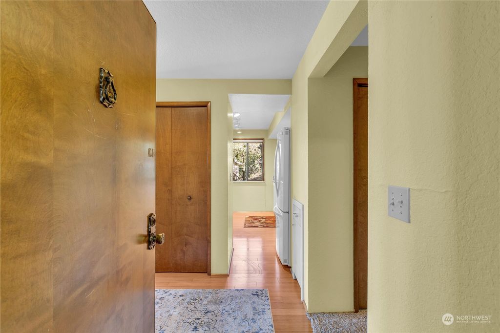Photo of 317 Kennebeck Avenue S #101, Kent, WA 98030 (MLS # 2225288)