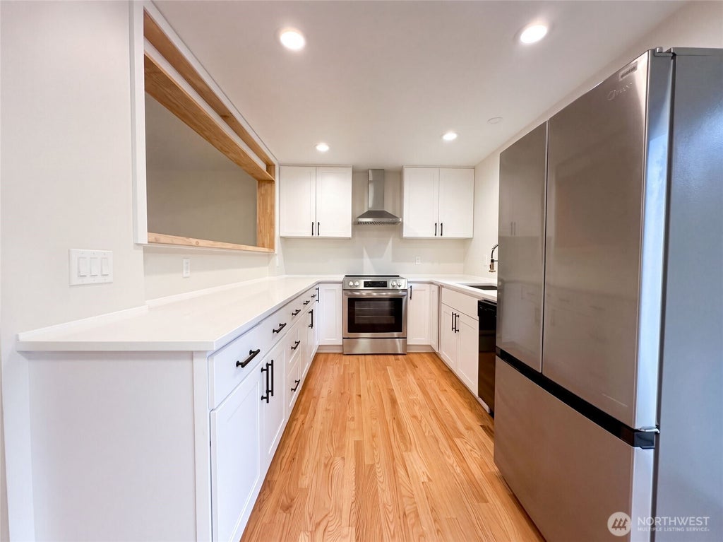 Photo of 11245 12th Avenue S, Seattle, WA 98168 (MLS # 2593081)
