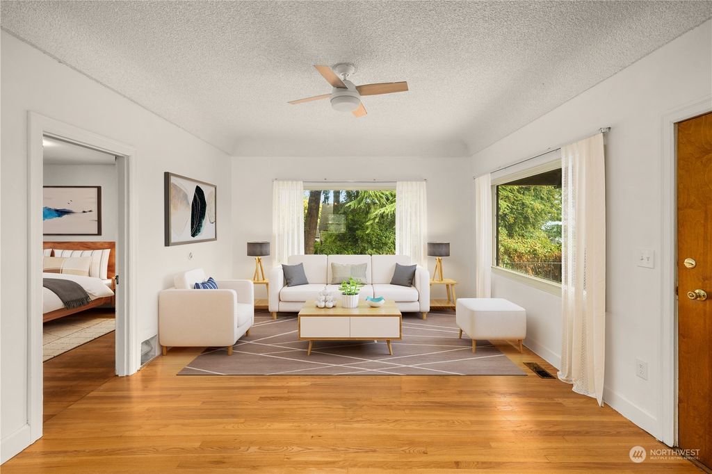 Photo of 12021 16th Avenue S, Seattle, WA 98168 (MLS # 2158195)