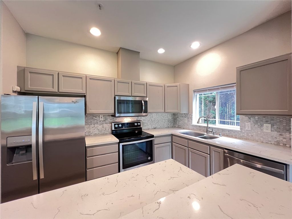 Photo of 10025 9th Avenue W #D-101, Everett, WA 98204 (MLS # 2536190)