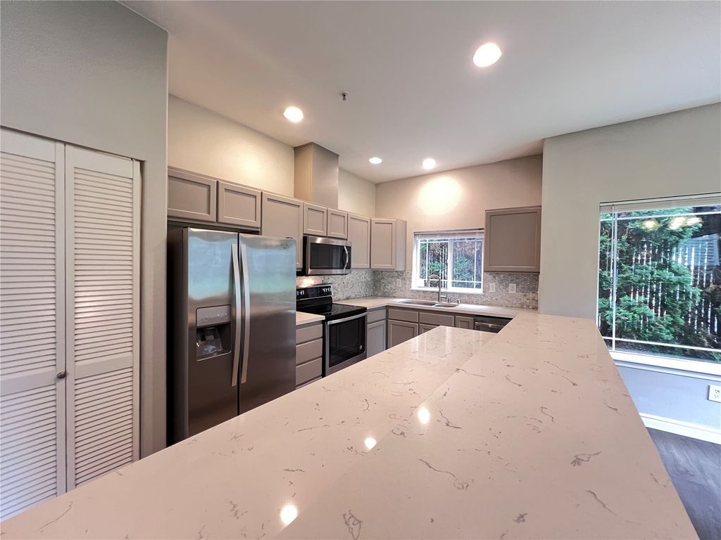 Photo of 10025 9th Avenue W #D-101, Everett, WA 98204 (MLS # 2536190)