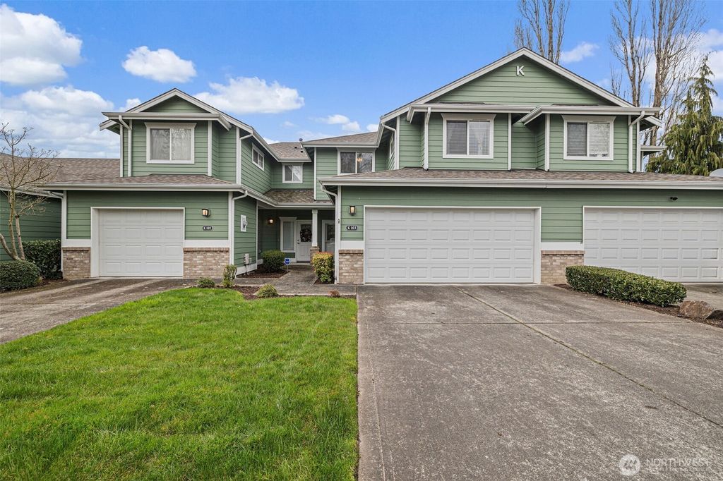 Photo of 10700 SE 260th St Street #K103, Kent, WA 98030 (MLS # 2355444)