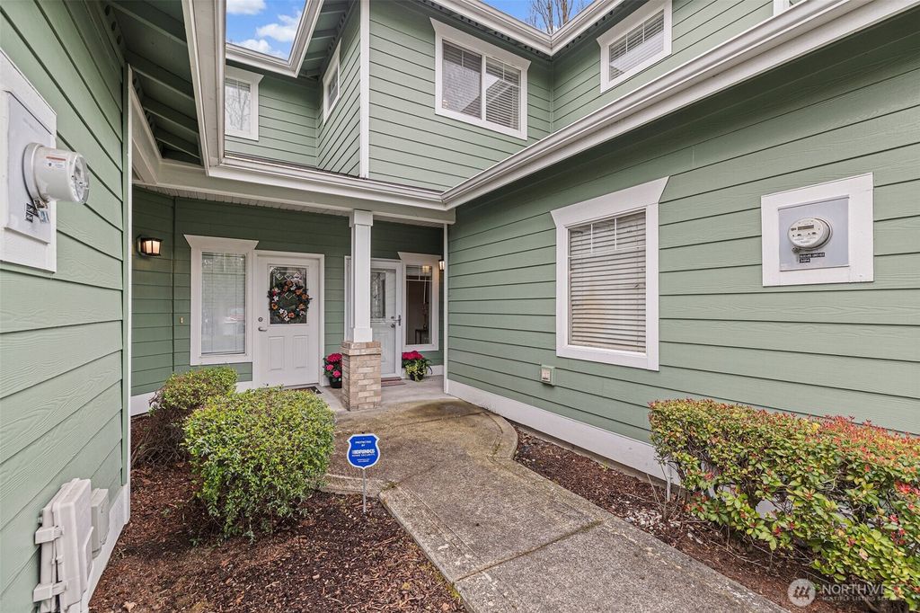 Photo of 10700 SE 260th St Street #K103, Kent, WA 98030 (MLS # 2355444)