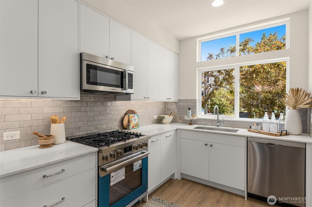 Photo of 8333 F 12th Avenue NW, Seattle, WA 98117 (MLS # 2438462)