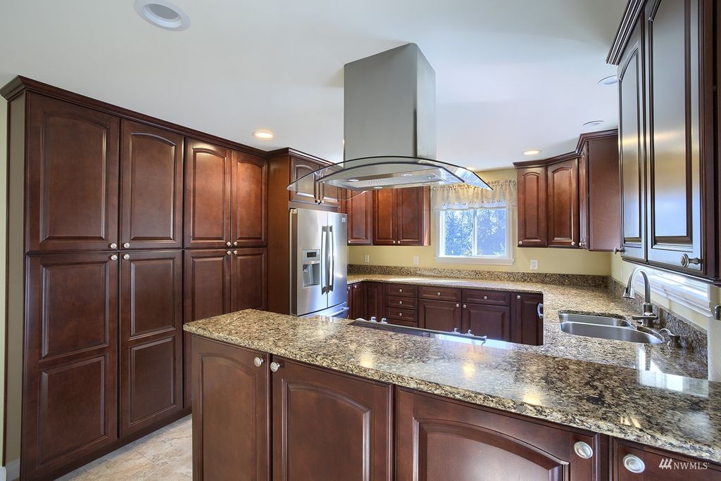 Photo of 4715 S 158th Street, Tukwila, WA 98188 (MLS # 1991028)