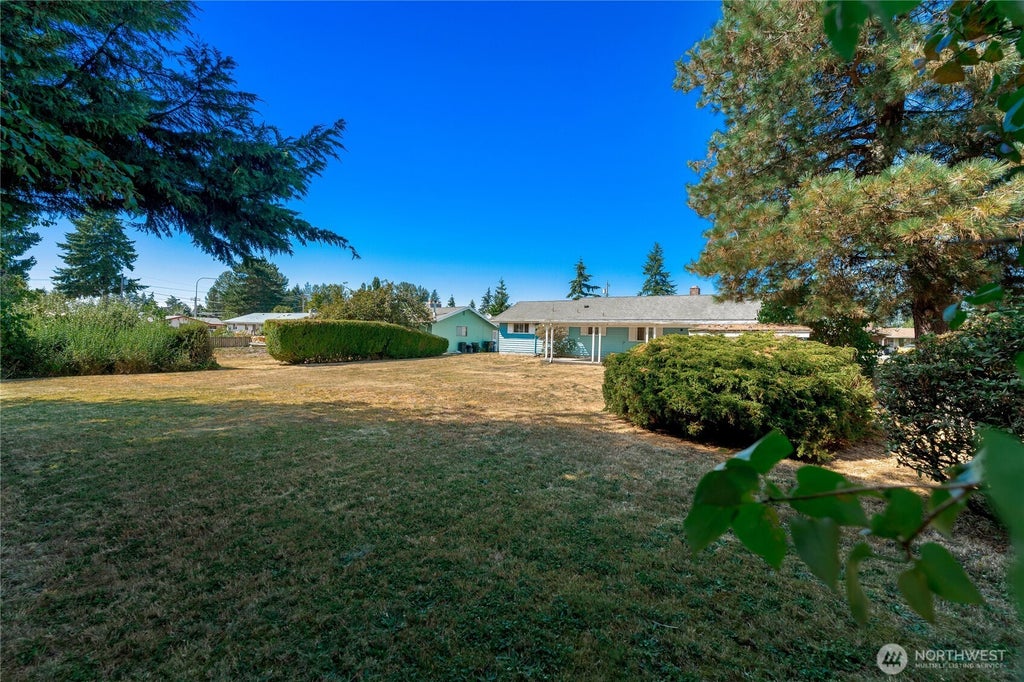 Photo of 10837 SE 217th Street, Kent, WA 98031 (MLS # 2570611)