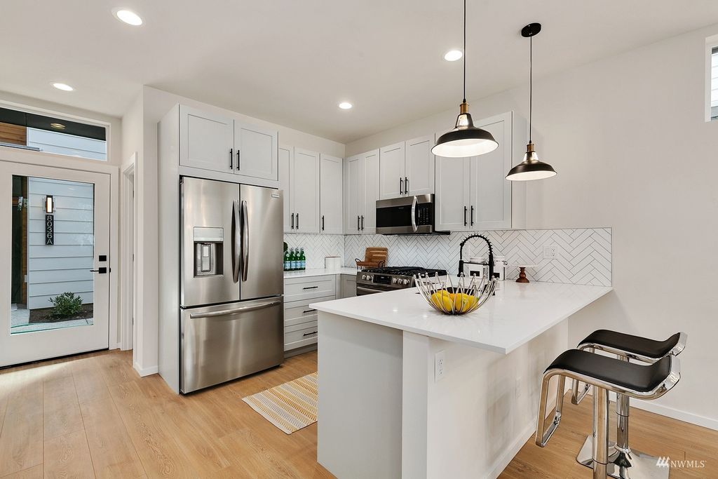 Photo of 8036 Mary Avenue NW #C, Seattle, WA 98117 (MLS # 1986778)