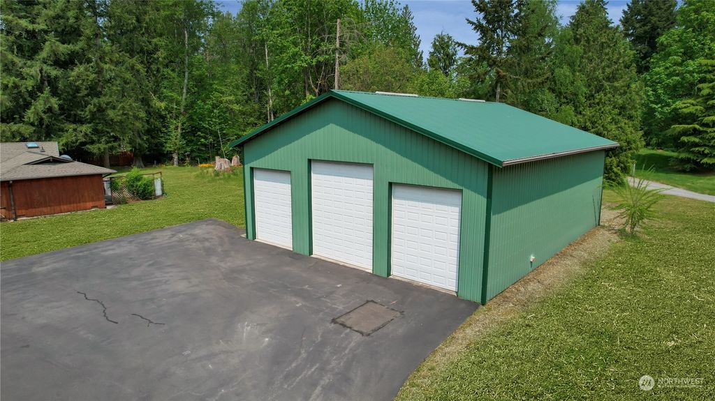 Photo of 19616 SE 310th Place, Kent, WA 98042 (MLS # 2068797)