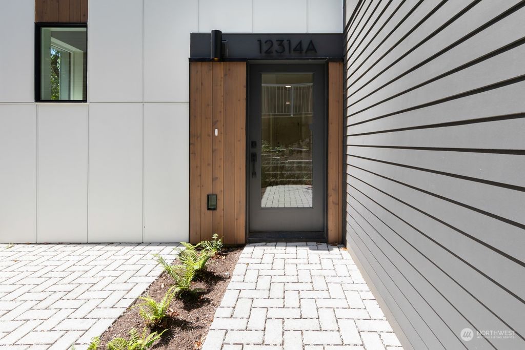 Photo of 12314 14th Avenue NE #A, Seattle, WA 98125 (MLS # 2239532)