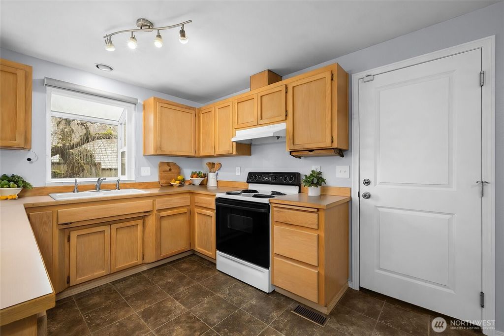 Photo of 1924 117th Drive SE, Lake Stevens, WA 98258 (MLS # 2324093)