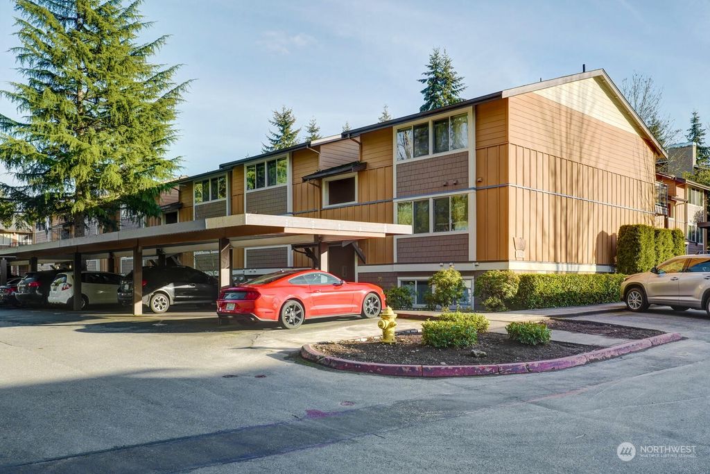 Photo of 8248 126th Avenue NE #C-103, Kirkland, WA 98033 (MLS # 2036385)