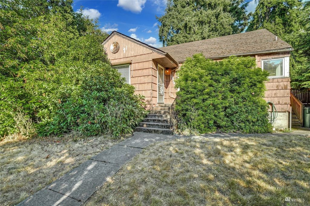 Photo of 10756 1st Avenue NW, Seattle, WA 98177 (MLS # 1992908)