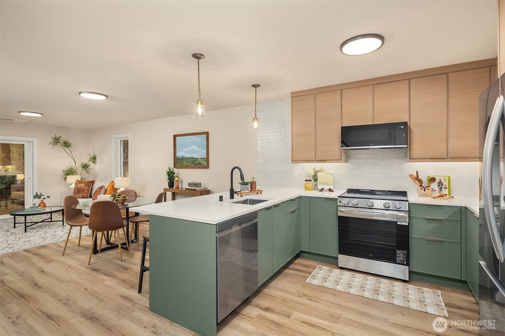 Photo of 11524 38th Avenue NE #A, Seattle, WA 98125 (MLS # 2421757)