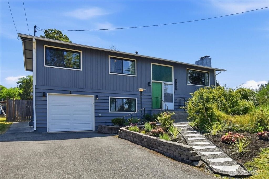 Photo of 10236 11th Avenue SW, Seattle, WA 98146 (MLS # 2554438)