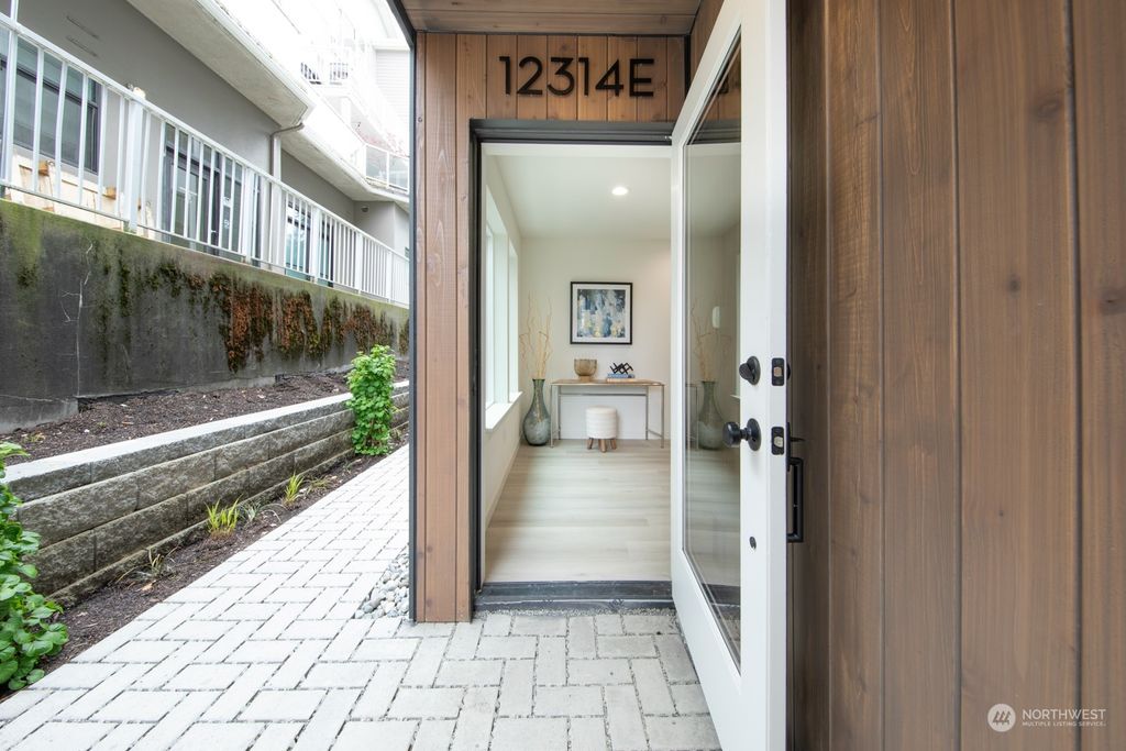 Photo of 12314 14th Avenue NE #E, Seattle, WA 98125 (MLS # 2221957)