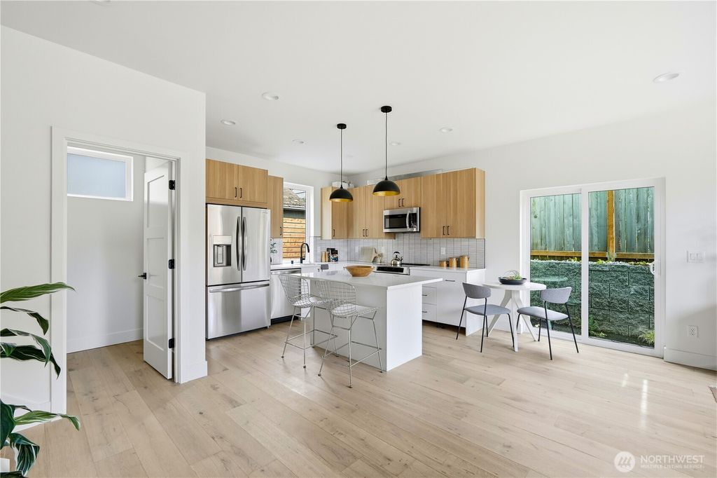 Photo of 7554 39th Avenue SW, Seattle, WA 98126 (MLS # 2454818)