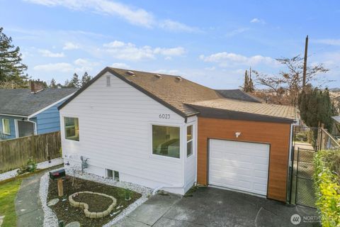 Photo of 6023 35th Avenue SW, Seattle, WA 98126 (MLS # 2494698)