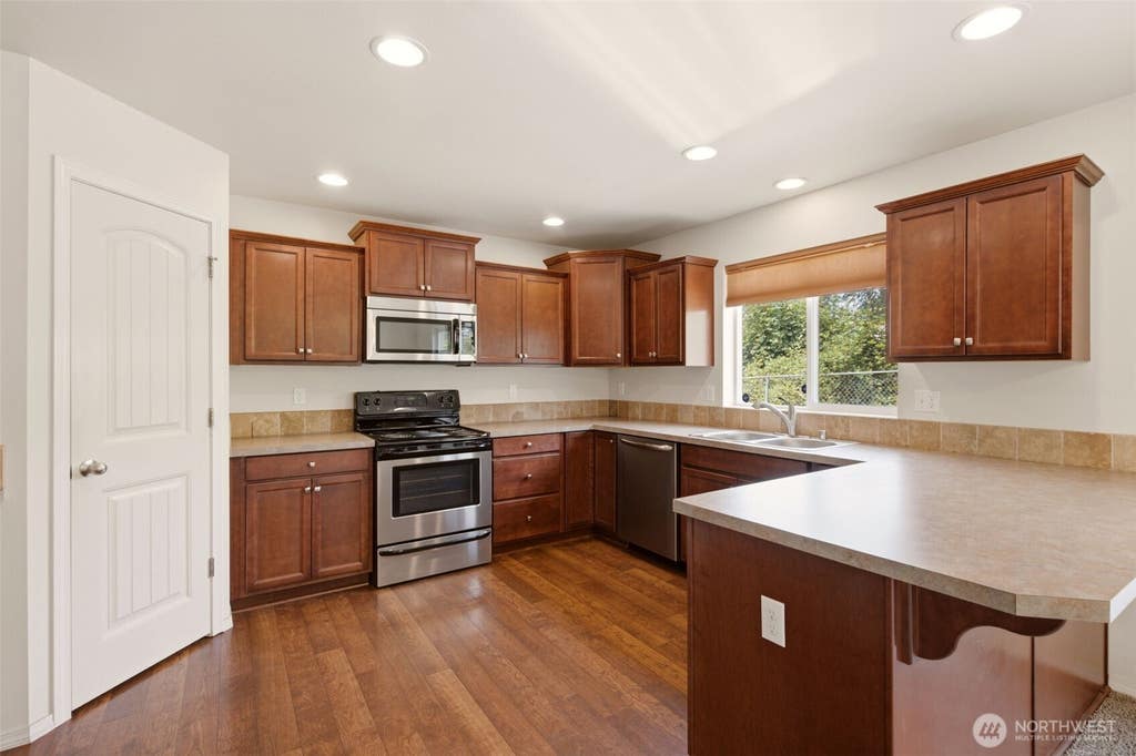 Photo of 22217 Military Rd S RD, SeaTac, WA 98198 (MLS # 2565472)