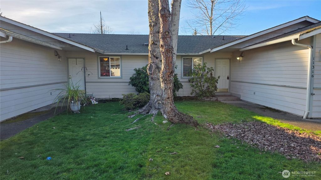 Photo of 11316 1st Avenue Ct E, Tacoma, WA 98445 (MLS # 2479590)