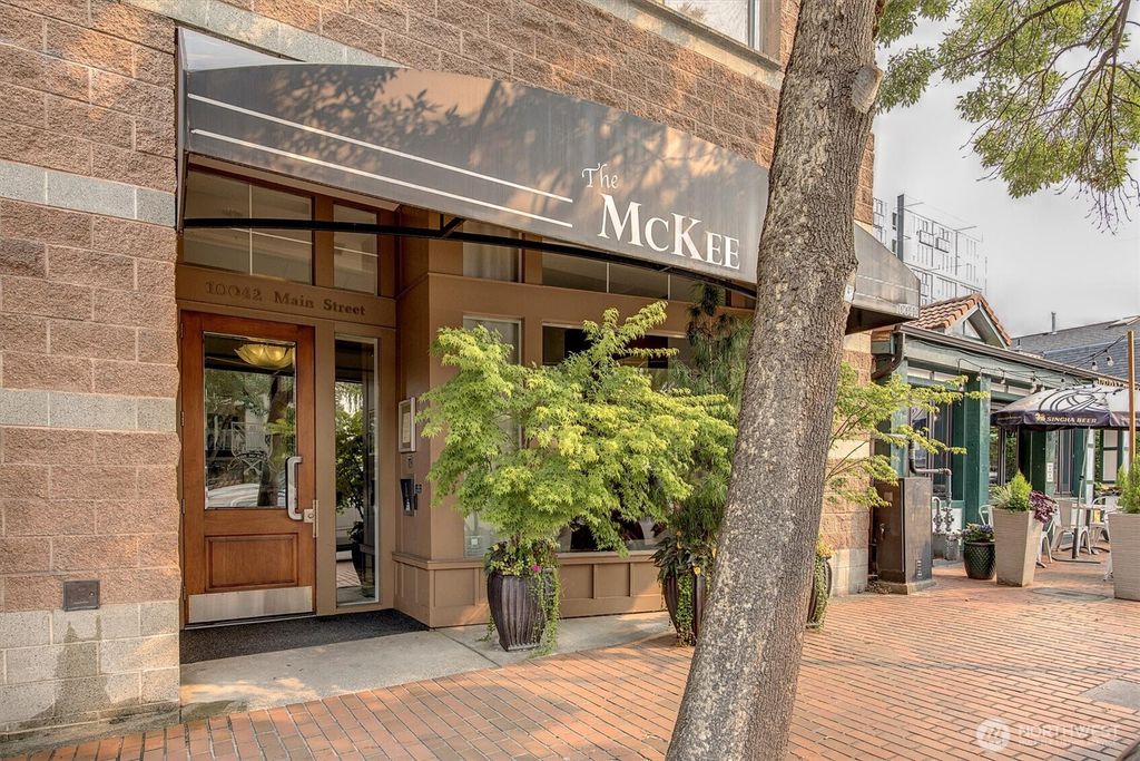 Photo of 10042 Main Street #404, Bellevue, WA 98004 (MLS # 2442919)