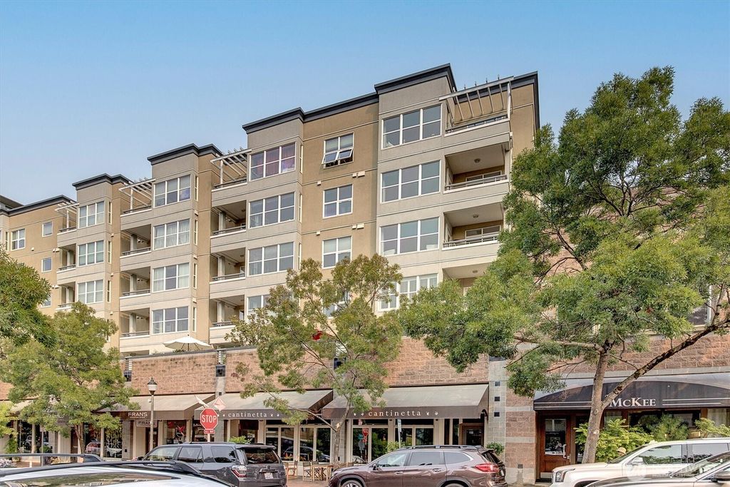 Photo of 10042 Main Street #404, Bellevue, WA 98004 (MLS # 2442919)