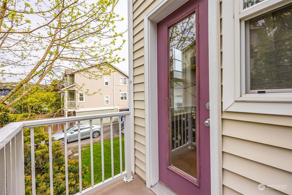 Photo of 6561 5th Avenue NE #D, Seattle, WA 98115 (MLS # 2063387)