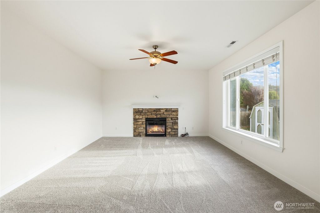Photo of 114 Ames Street NE, Orting, WA 98360 (MLS # 2447744)