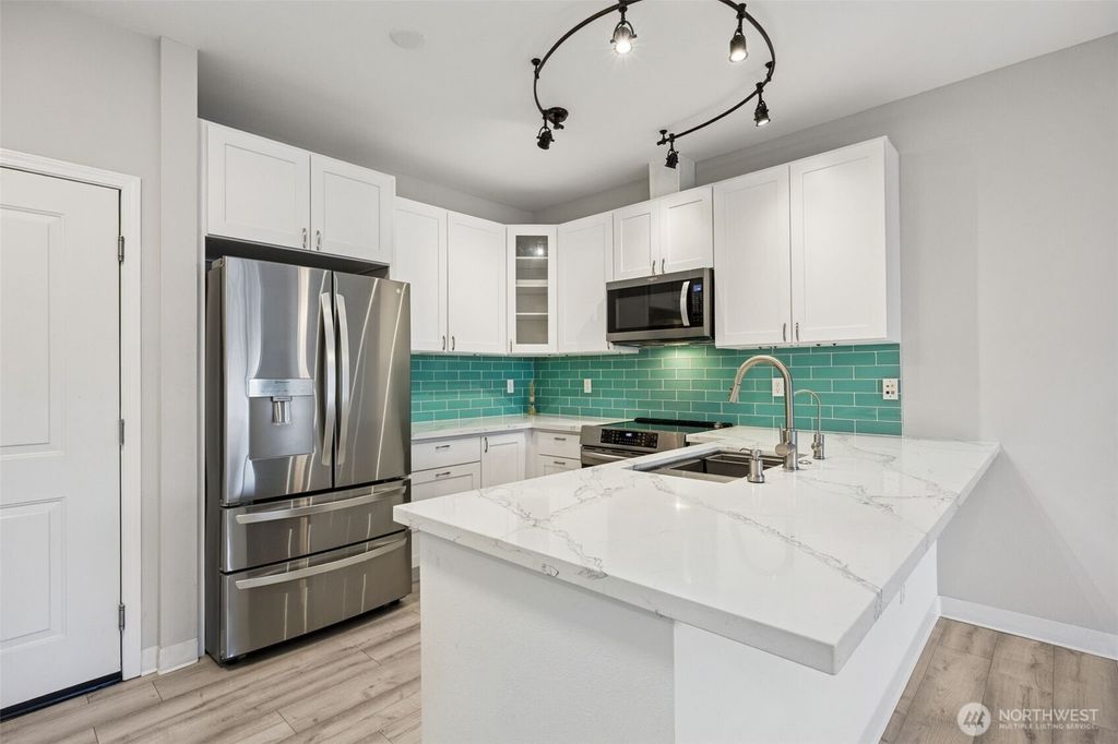 Photo of 1736 10th Avenue NE #C208, Issaquah, WA 98029 (MLS # 2471006)